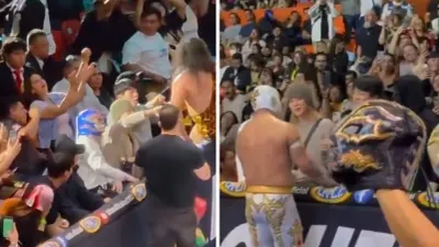 Asisten integrantes de BTS a función de lucha libre y saludan a Místico