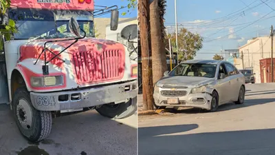 Camión de transporte impacta auto y lo proyecta contra poste en el Centro