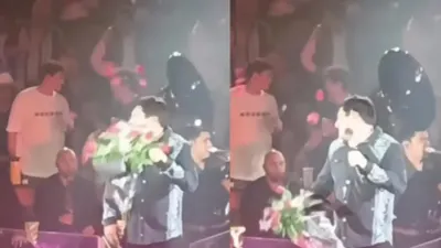 Golpean a Julión Álvarez con ramo de flores en pleno show