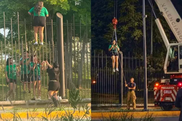 Intenta brincar barda para ingresar a Fan Fest y termina rescatada con grúa