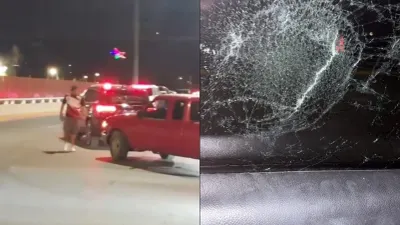 Hombre con piedra en mano ataca camioneta de mujer en el puente Libre