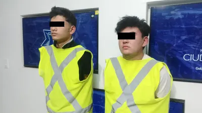 Detienen a dos por asalto a mano armada en negocio de la Melchor Ocampo